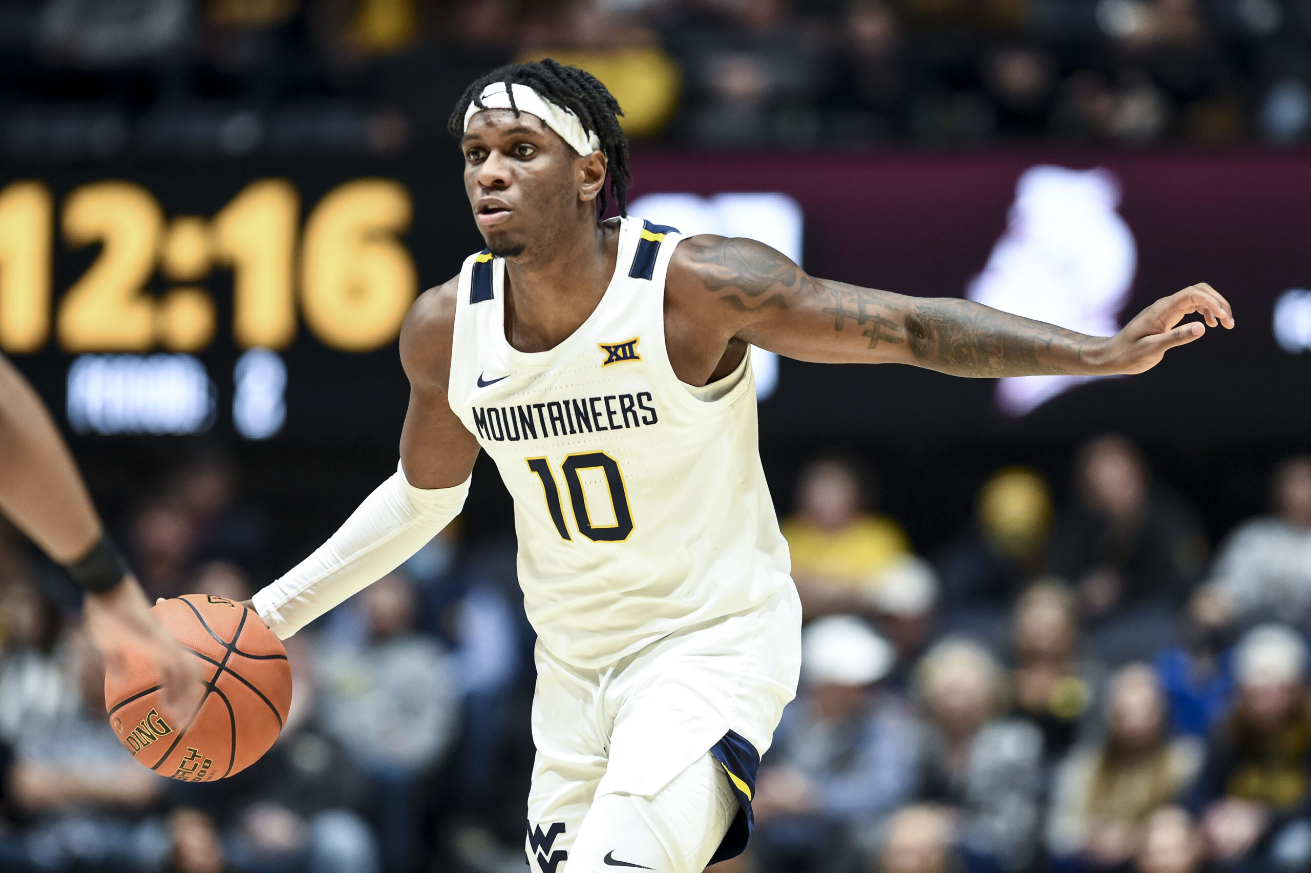 NOTEBOOK: Huggins wants to see better passes from point guards Kedrian Johnson, Malik Curry